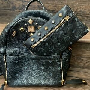 MCM Black Leather Backpack with Gold Accents